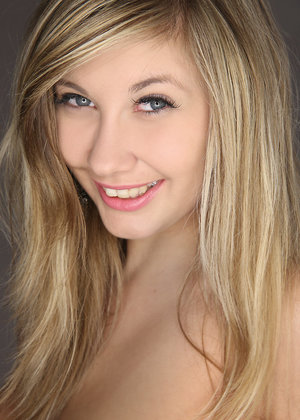 18 year old girl Agnes uncovers her perky tits as she gets completely naked